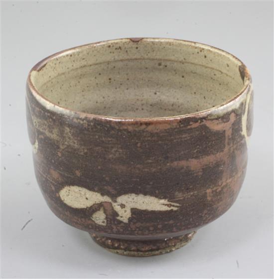 Manner of Shoji Hamada. A Studio pottery cup, diameter 11cm, restored chip